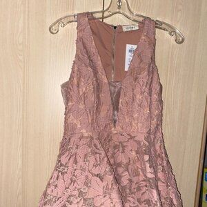 Honey Dress size S, pink in colour, brand new.